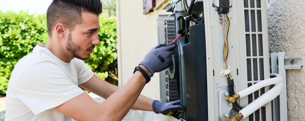 Precise AC Expert Fixing a Mini Split ac - Precise Air Lennox, Los Angeles, CA